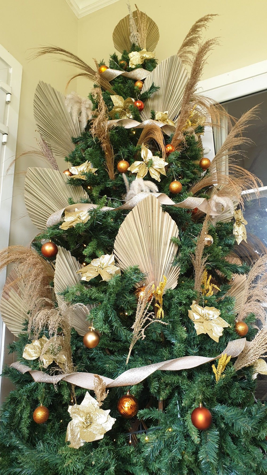 Bohemian Christmas Tree Decor regarding Leaves on a Christmas Tree