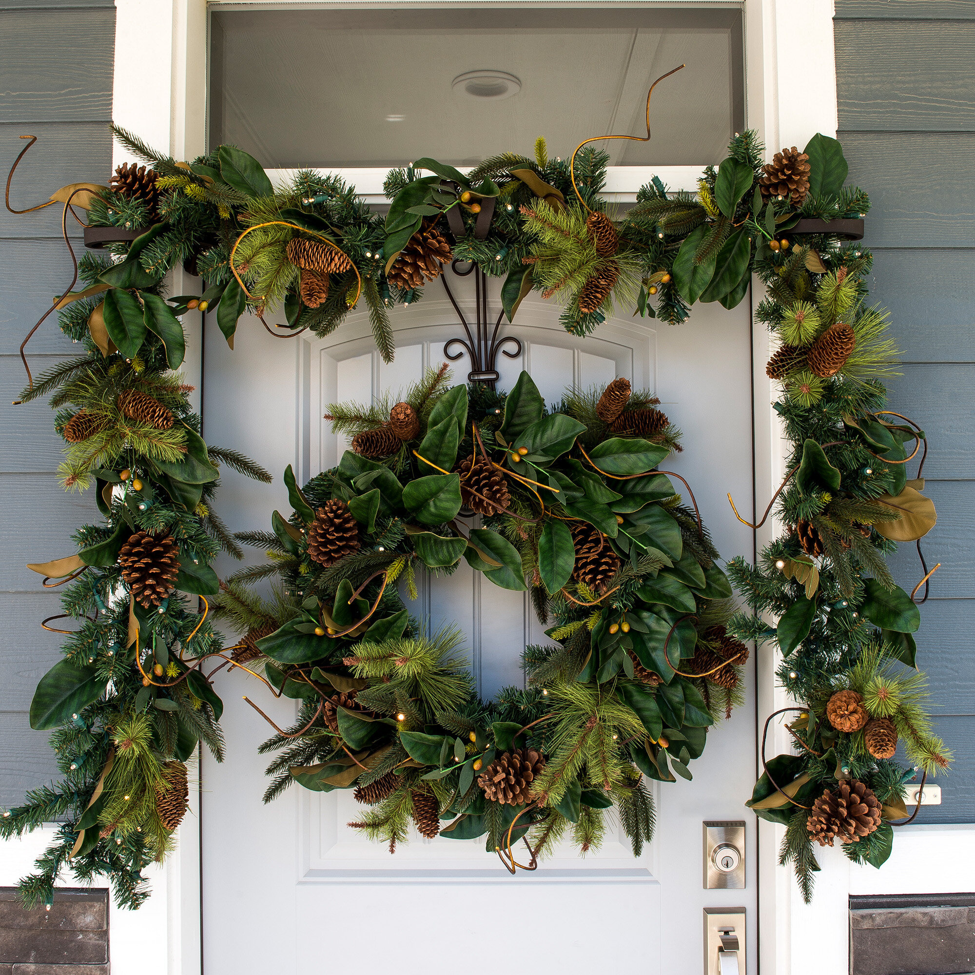 The Holiday Aisle® 9 Ft. Artificial Garland With Lights - Magnolia with Christmas Garland Leaves